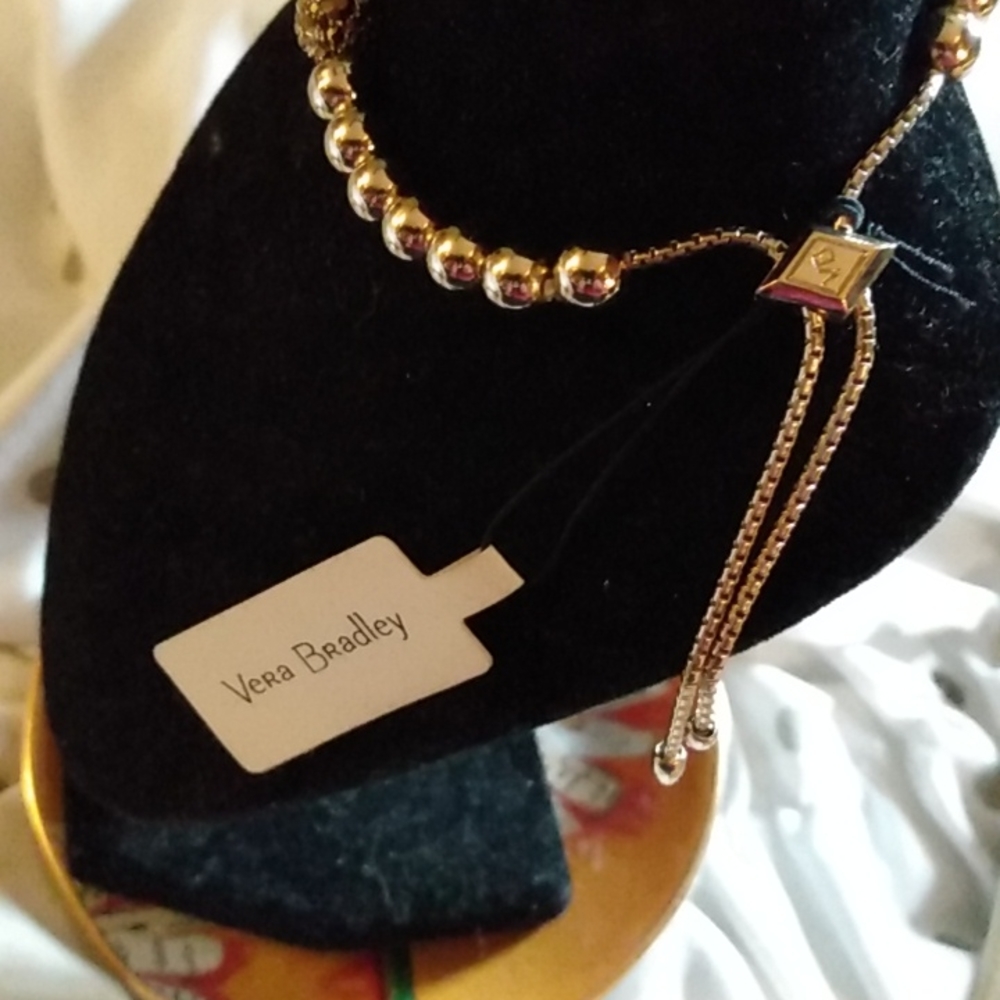 Vera Bradley Baubles slider.  Gold baubles include some black.
